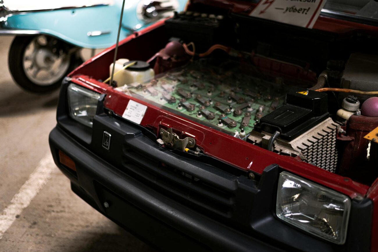close up of car components under hood